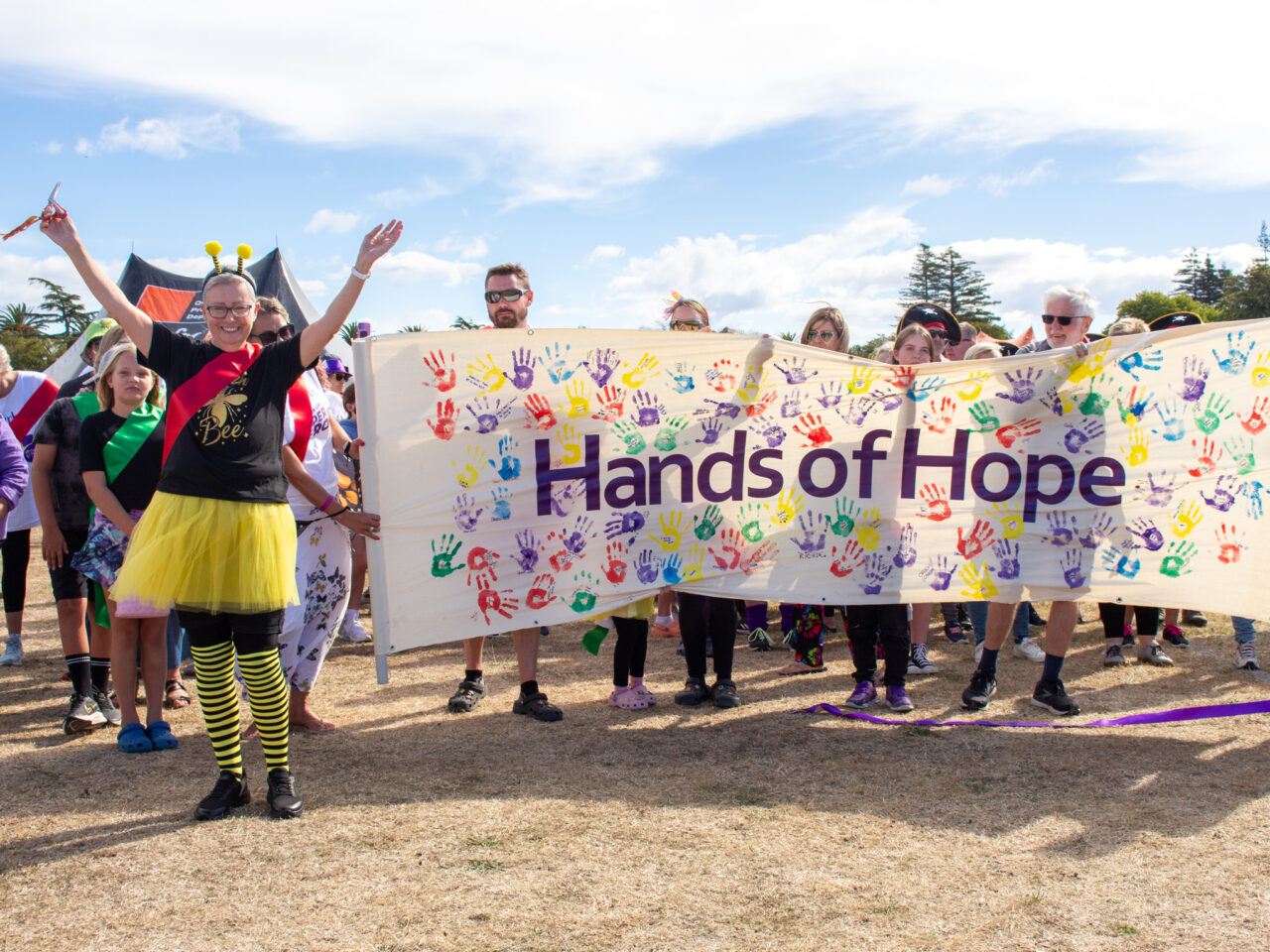 Maria Bartlett cuts the ribbon at Relay for Life