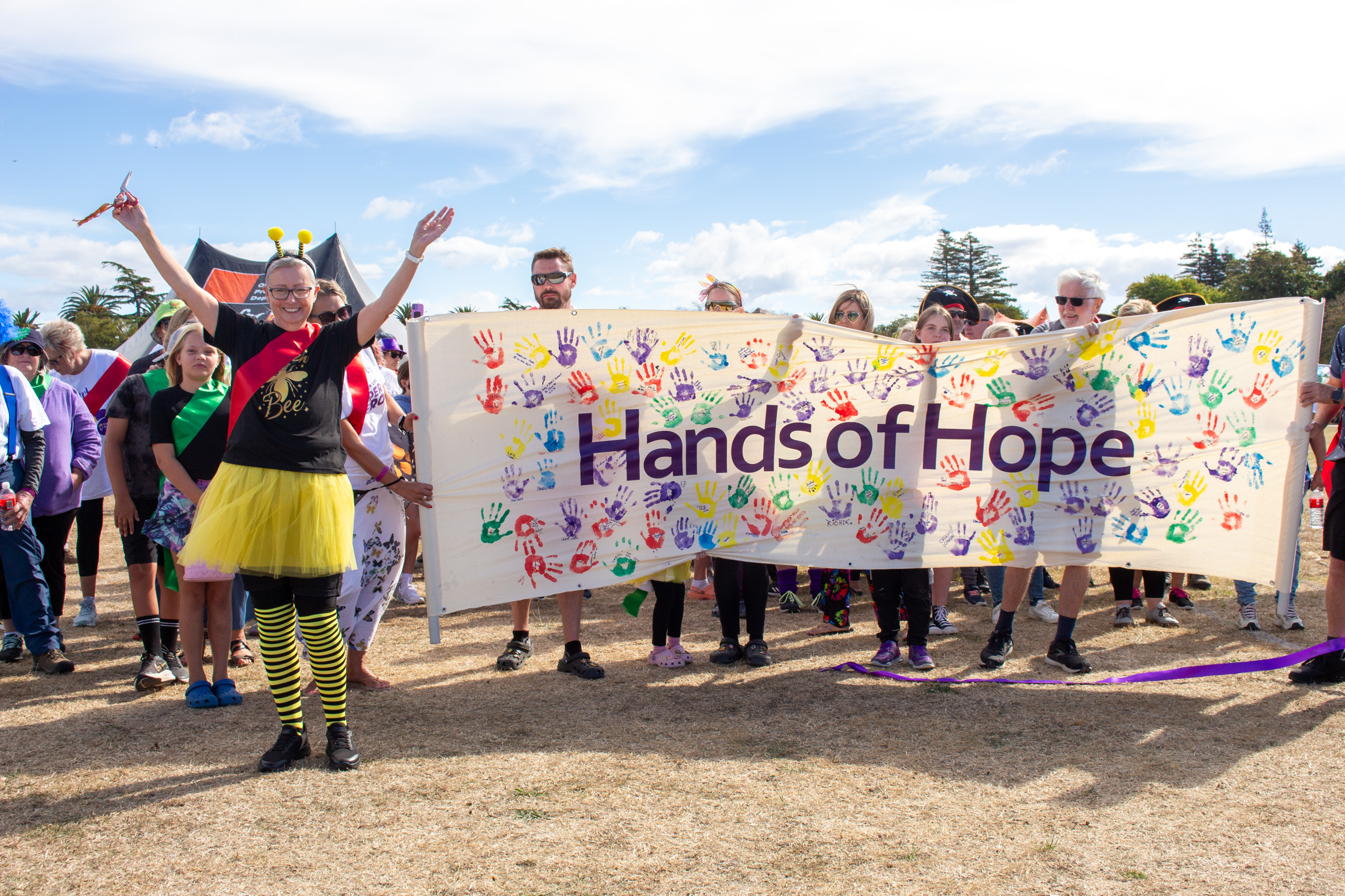 Maria Bartlett cuts the ribbon at Relay for Life